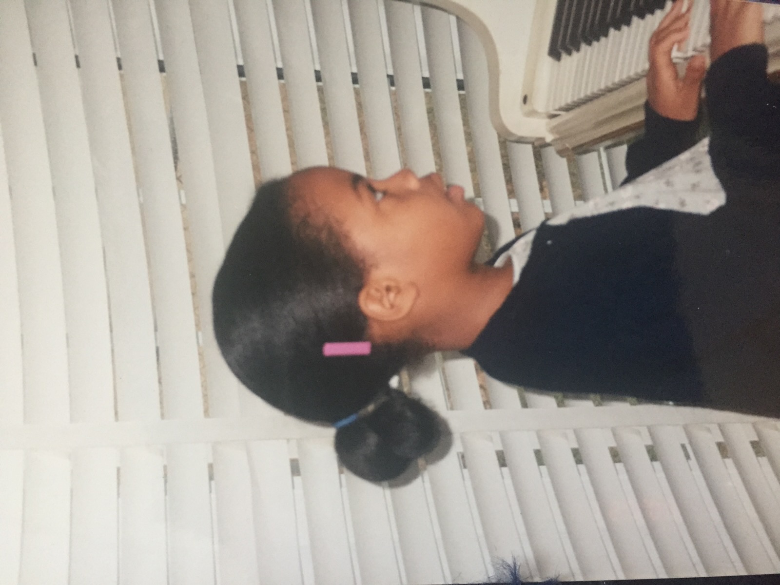 Liliane Pearl at the piano as a child